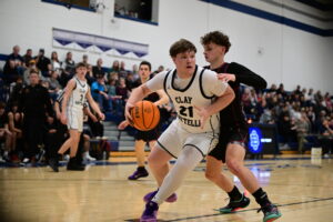 Clay-Battelle outlasts Trinity Christian in overtime, 69-62, in key Region I matchup